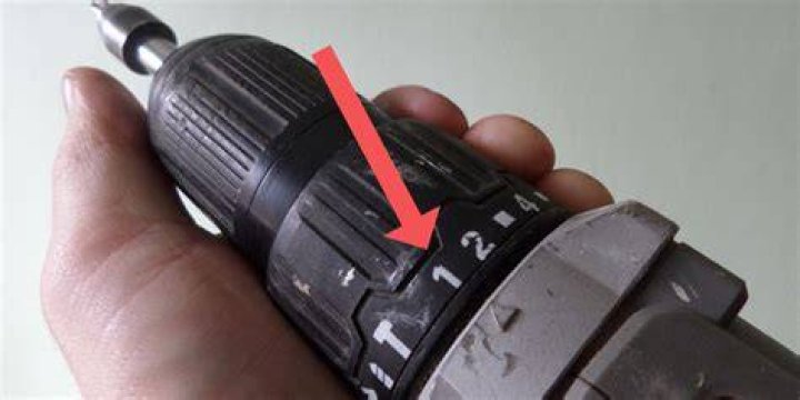 How do you adjust the torque on a drill?