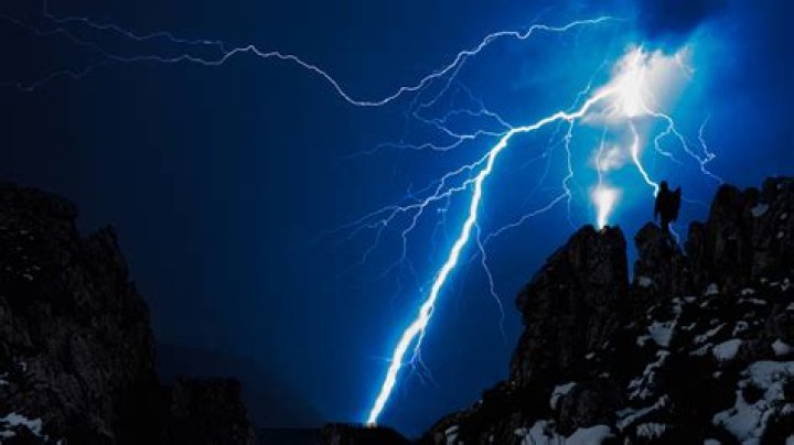 What causes lightning to strike a person?