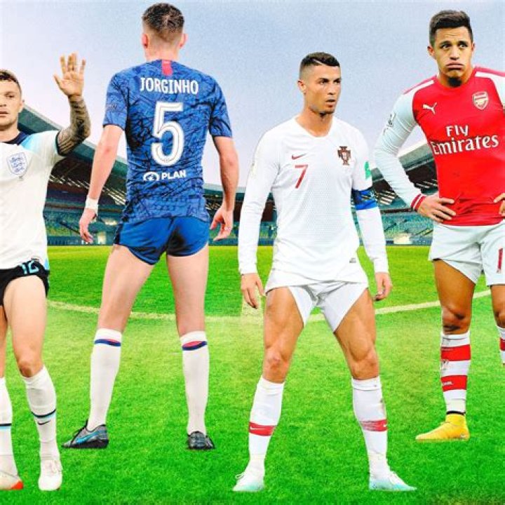 Why do footballers pull one leg of their shorts up?