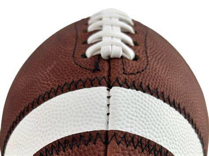 Why is a football shaped like an oval?